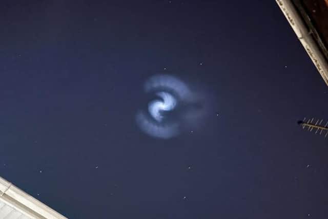 The spiral, believed to be from a SpaceX rocket launch, was spotted in the skies above Doncaster. Photo: Amy Bird/Video: Al West).