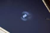 The spiral, believed to be from a SpaceX rocket launch, was spotted in the skies above Doncaster. Photo: Amy Bird/Video: Al West).