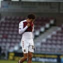 Northampton's Shaun McWilliams leaves the pitch after his sending off against Rovers