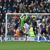 Bradford City's Andy Cook scores the decisive goal in his team's win over Doncaster Rovers.