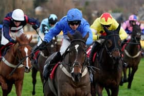 Adam Wedge riding Mack The Man (blue). Photo by Alan Crowhurst/Getty Images