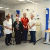 Sarah Taylor (left) joined by the Medical Day Unit team and Anne and her son