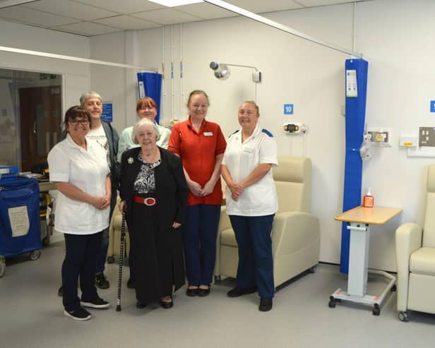 Sarah Taylor (left) joined by the Medical Day Unit team and Anne and her son