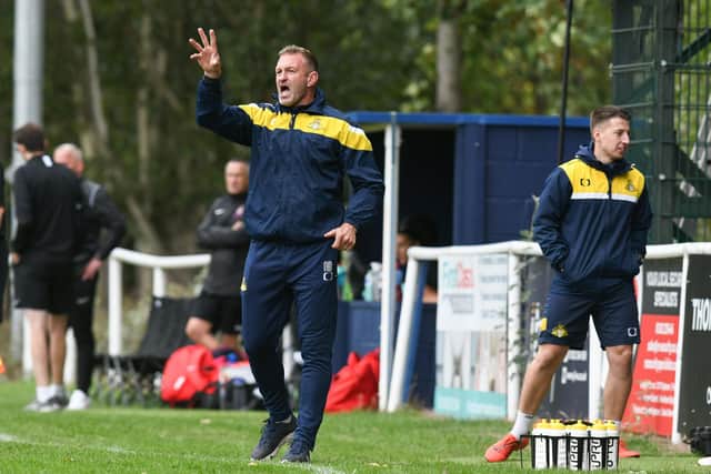 Doncaster Rovers Belles manager Nick Buxton gives orders from the touchline.