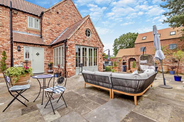 A sun trap garden with plenty of space for relaxing outdoors.