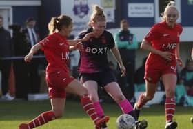 Lindsey Tugby and Phoebe Sneddon in action against Nottingham Forest. Photo: Julian Barker