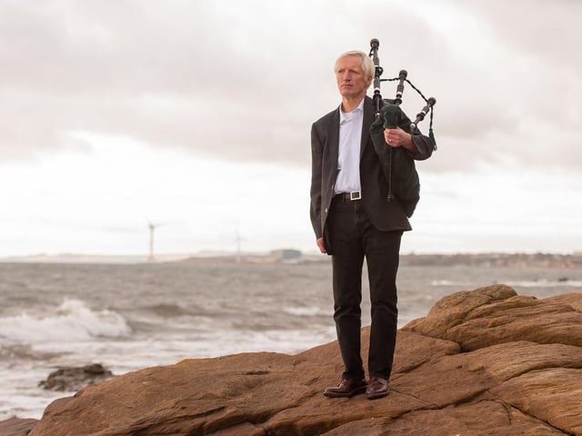 At Lundin Links beach
Iain Todd (from Dundee, living in Lundin Links), PhD Geography & Sustainable Development - playing the pipes on the beach near his home. Iain is the Chair of the City of St Andrews Pipe band, which has been unable to practise together since the summer.
As a marker of this unique and challenging period, we wanted to celebrate the essence of the St Andrews graduate during these unprecedented times. By recording their thoughts on life in 'the bubble' and beyond, we hoped, in a small way, to capture the spirit of our Saints of 2020. In a collaboration with graduating English Masters student Sophia Eve Rink, who came up with the theme of Reflections, we invited seven students still in the area to take part in a socially distanced outdoors photoshoot, in a location that was important to them.