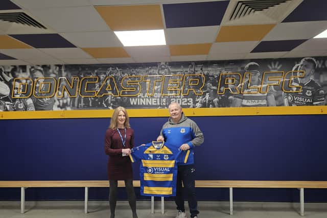 Cathy Hinde, DCLT Head of Marketing and Business Development with Carl Hall, Chief Executive of the Dons.