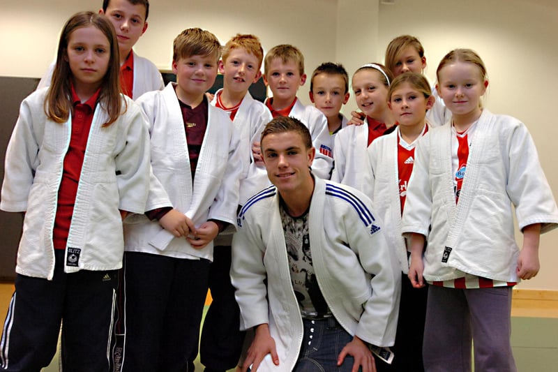 Jordan and these school children had a great time trying out martial arts. Remember this?