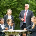 Headmaster David Holland with pupils.