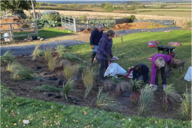 Volunteers have transformed the patch of wasteland.