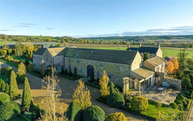 The stunning property within landscaped gardens has views that extend for miles across rural North Yorkshire.