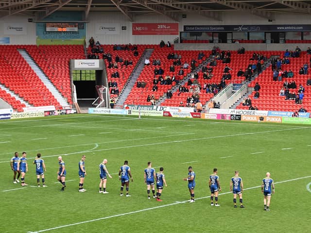 Spectators enter the Keepmoat Stadium for the first time in 14 months for the match between Doncaster RLFC and West Wales Raiders