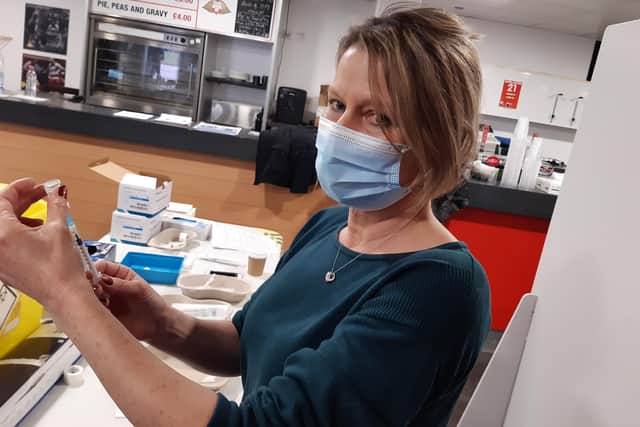 Retired doctor Carolyn Bloor working as a volunteer at the Covid vaccination clinic at the Keepmoat Sadium, Doncaster