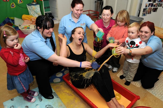 Cleadon Kindergarten nursery nurse Gemma Lazenby sits in a bath of gloop in aid of Comic Relief in 2011.