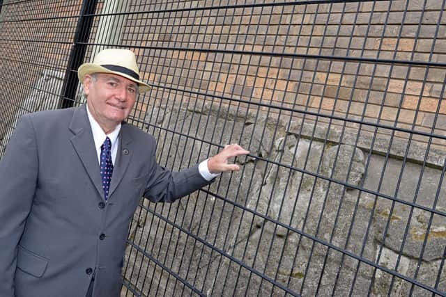 Ron Curry MBE, pictured with the Frieze that was on th former Gaumont Cinema. Picture: NDFP Frieze MC 1