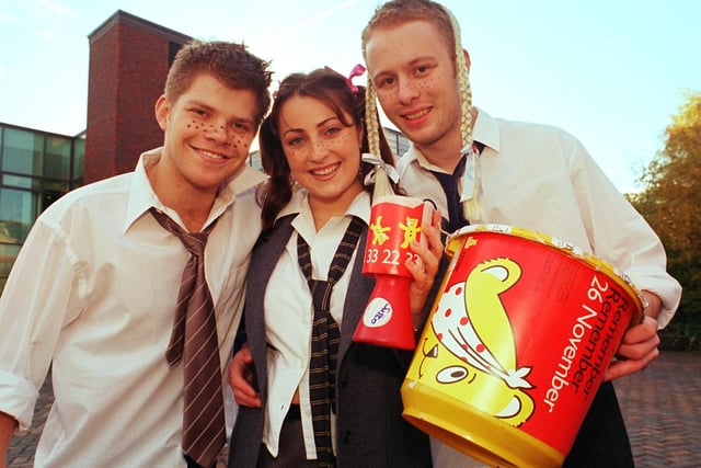 Tim Jones, Kate MacFarlane and George Morton of the Sheffield University Theatre collect for Children in Need out side the Student's Union in 1999