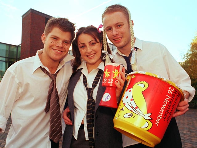 Tim Jones, Kate MacFarlane and George Morton of the Sheffield University Theatre collect for Children in Need out side the Student's Union in 1999