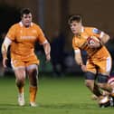 Fighting back: Morgan Strong of Doncaster Knights, on the ground, tackles Seb Kelly of Sale Sharks in the Premiership Cup (Picture: Jan Kruger/Getty Images for Sale Sharks)
