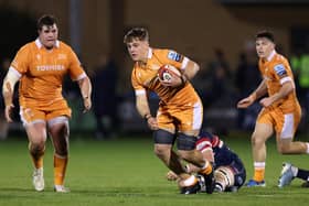 Fighting back: Morgan Strong of Doncaster Knights, on the ground, tackles Seb Kelly of Sale Sharks in the Premiership Cup (Picture: Jan Kruger/Getty Images for Sale Sharks)
