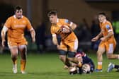 Fighting back: Morgan Strong of Doncaster Knights, on the ground, tackles Seb Kelly of Sale Sharks in the Premiership Cup (Picture: Jan Kruger/Getty Images for Sale Sharks)
