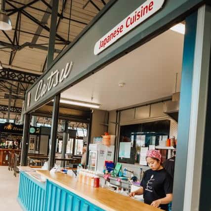 The stall sells sushi and rice bowls as well as other Japanese food.
