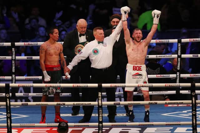 Maxi Hughes celebrates beating Jovanni Straffon to win the IBO world lightweight title. Photo by George Wood/Getty Images