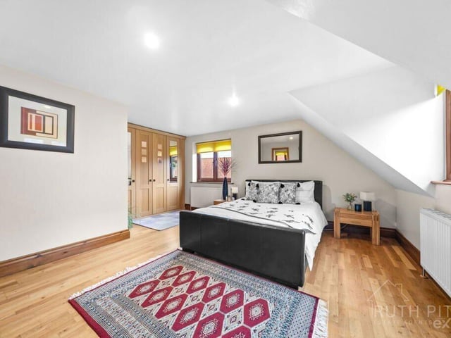 One of four stylish and good-size bedrooms within the property.