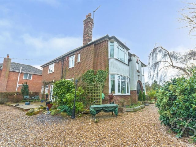 Stepping outside now, and here is a side-on view of the £525,000 Tor Lane property. Quite an imposing sight, don't you think?