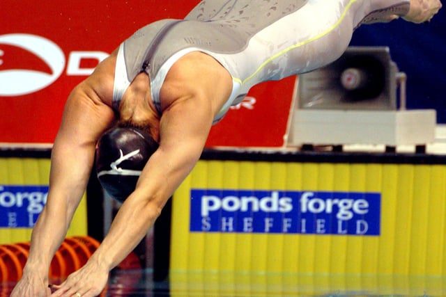 Alison Sheppard's fingers touch the water after her full length dive at the start of her 50 Metre Freetsyle semi-Final win in 2004