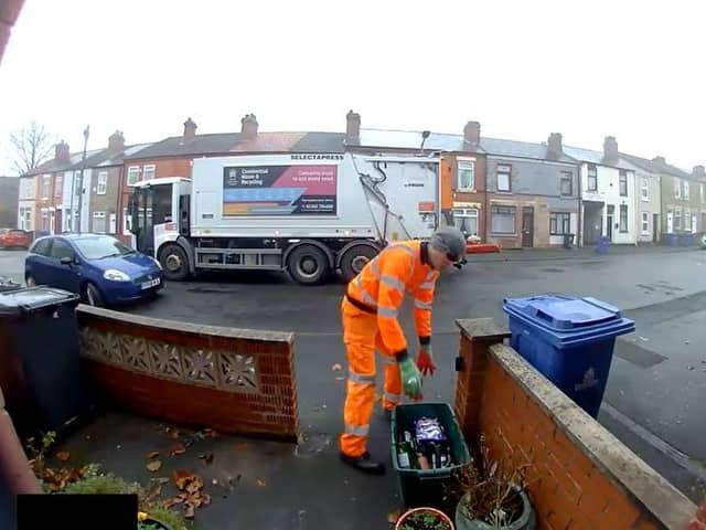 Big-hearted Claire Woodhall, who has been leaving a treat for bin workers for the last five or six years, captured the moment an employee missed a box of chocolate - and hurled them into the back of his truck by mistake.