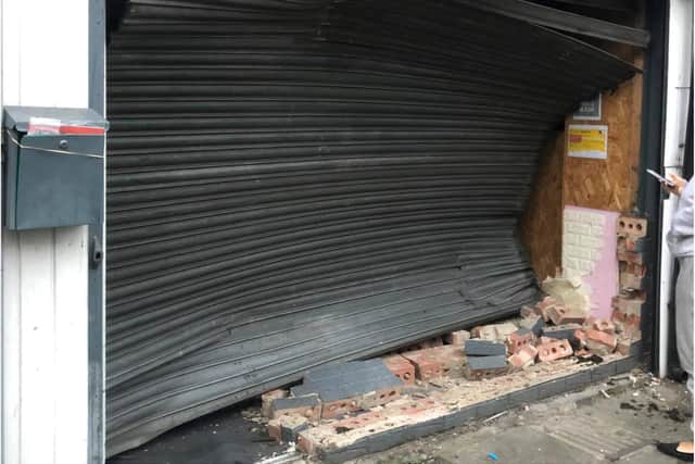The damage to the front of Goodies Desserts in Mexborough.