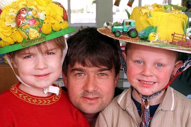 Rovers boss Ian Snodin is pictured with Hawthorn Primary School pupils Curtis Faultless, left, and Lee Weston, both 5 years old.The pupils from the reception class were judged joint winners because Ian was unable to choose between them....March 1999