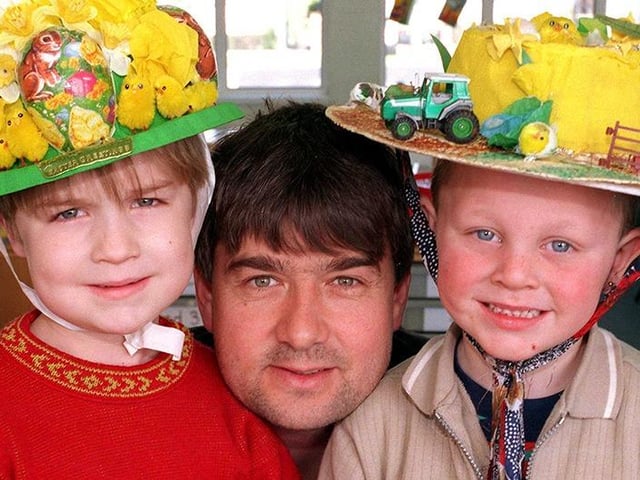Rovers boss Ian Snodin is pictured with Hawthorn Primary School pupils Curtis Faultless, left, and Lee Weston, both 5 years old.The pupils from the reception class were judged joint winners because Ian was unable to choose between them....March 1999