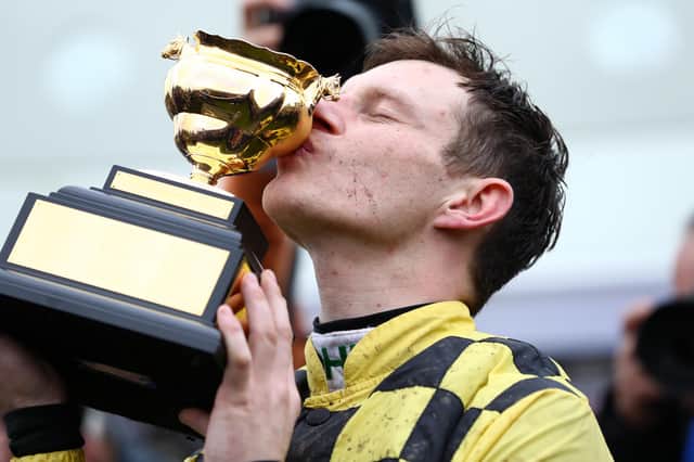 Jockey Paul Townend kisses the Cheltenham Gold Cup after his win on Al Boum Photo last year. (PHOTO BY: Michael Steele/Getty Images)