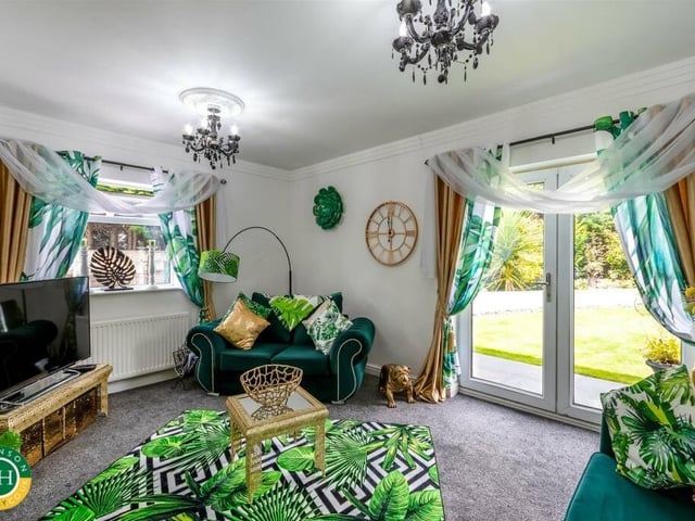 More space for relaxatgion, with double doors out to the garden.