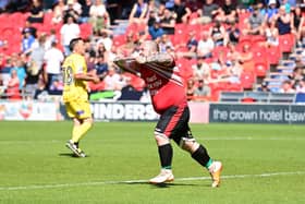 John Drury, one of Doncaster's guest players, pays tribute to his son after scoring against Liverpool.