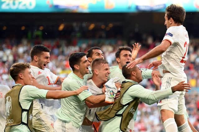 Spain's Mikel Oiarzabal (R) celebrates with teammates after scoring their fifth goal against Croatia. Photo by STUART FRANKLIN/POOL/AFP via Getty Images