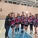 Louise Holland (third from left, GA jersey) with some of who she described as her "netball family."