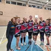 Louise Holland (third from left, GA jersey) with some of who she described as her "netball family."