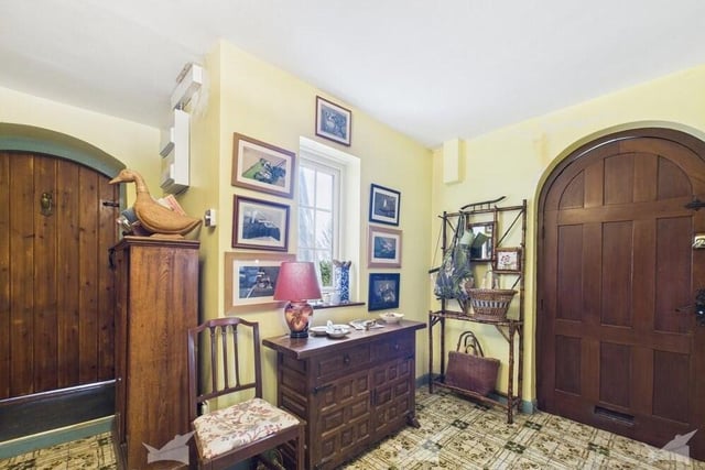 Large arched doors add to the great character of the property.