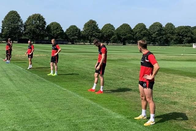 The Doncaster Rovers squad training under social distancing regulations at Cantley Park