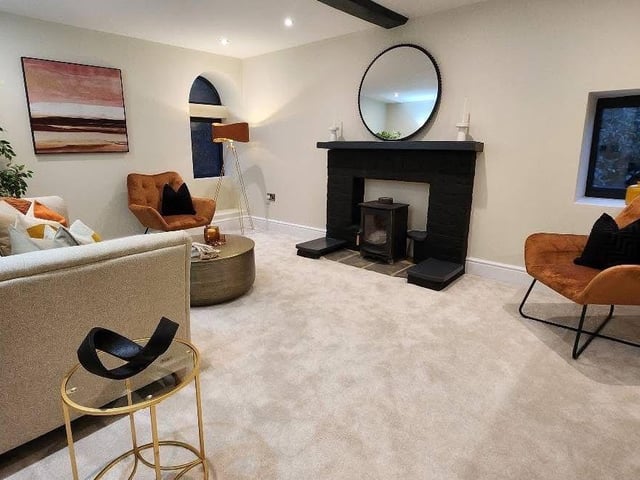 Beamed lounge space for relaxation.