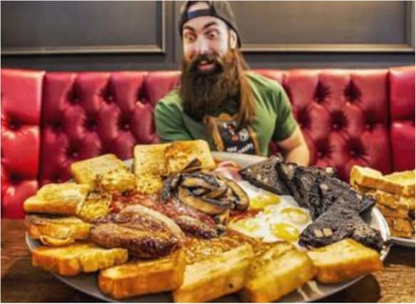 BeardMeatsFood gets ready to take on the breakfast challenge at the Tattooed Goose.