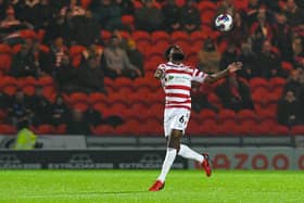 Doncaster Rovers defender Ro-Shaun Williams controls the ball against Walsall.