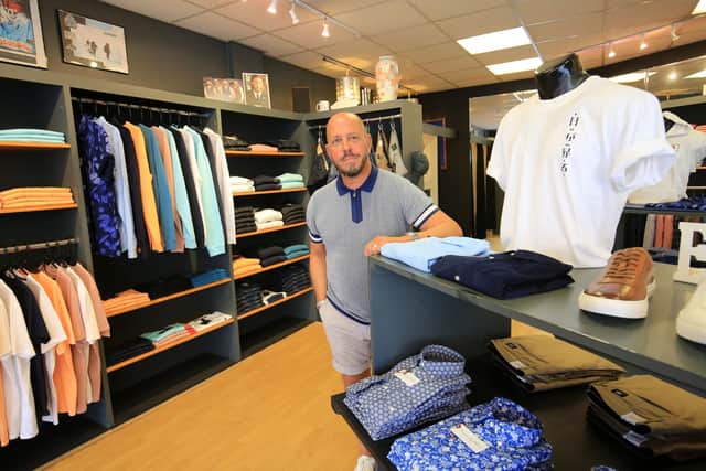 Shops in Doncaster Town Centre start to reopen. Phil Elvin from Punch Menswear which has reopened on Wood Steet. Picture: Chris Etchells
