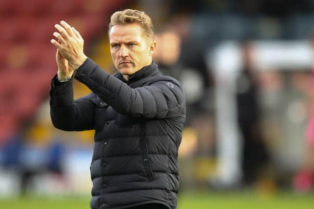 Gary McSheffrey thanks the fans after Doncaster's win over Rochdale.