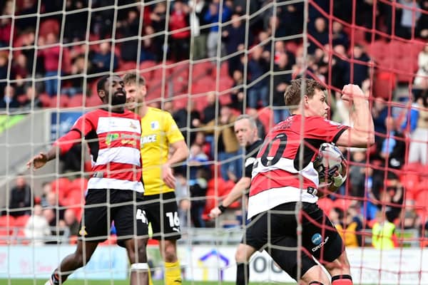 Joe Ironside celebrates his penalty to start the superb comeback by Grant McCann's side.