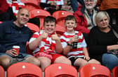 Doncaster Rovers fans watch the win over Gillingham.