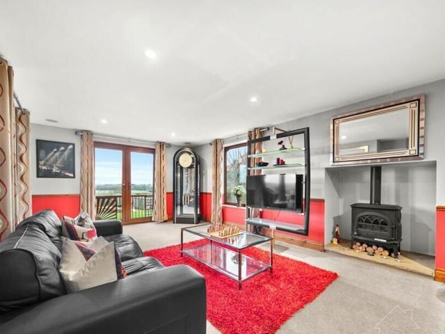 A reception room with a view - and French doors leading outside.